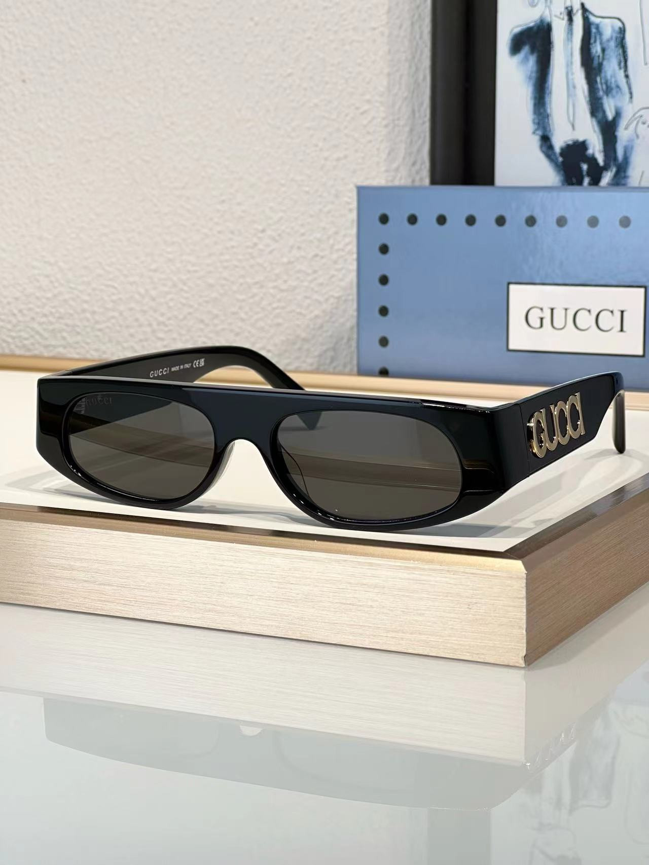 G*u*i sunglasses