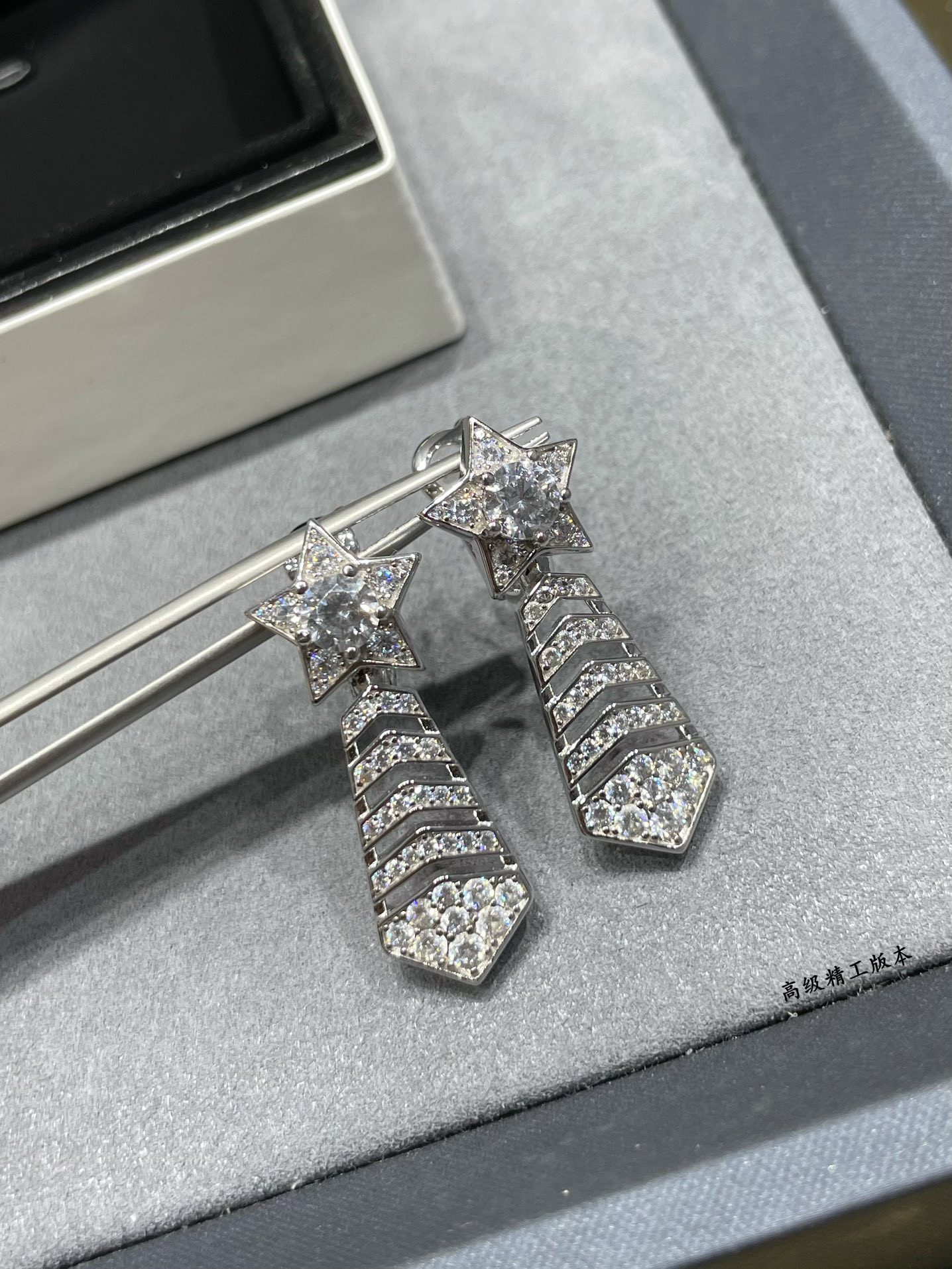 Ch*el comet earrings