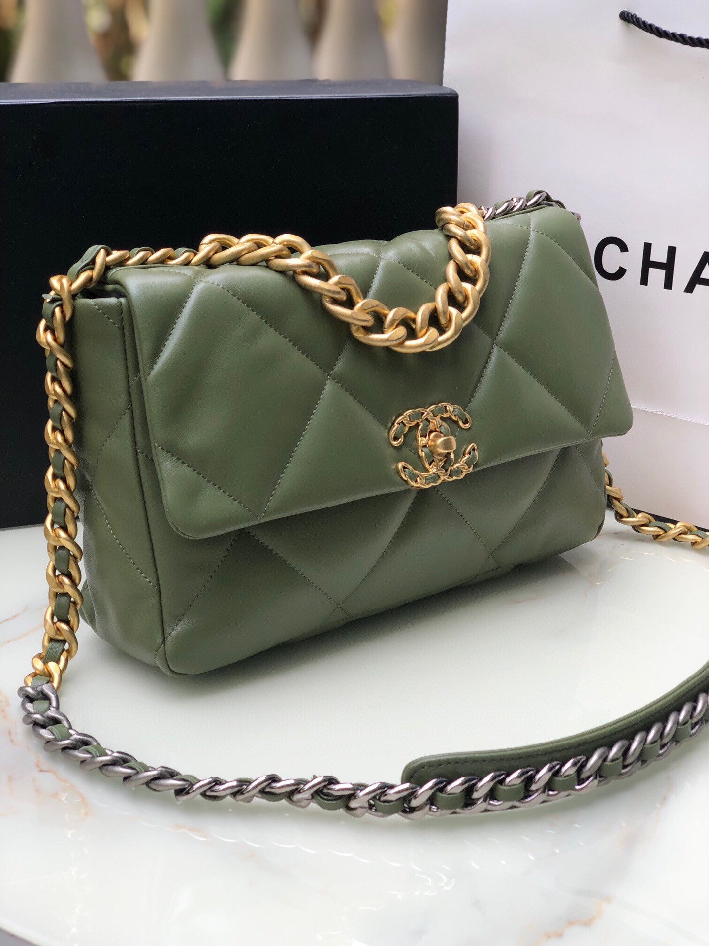 Ch*el 19 large handbag shiny leather, gold-tone, silver-tone & ruthenium-finish metal dark green 7.8 × 11.7 × 3.9 in