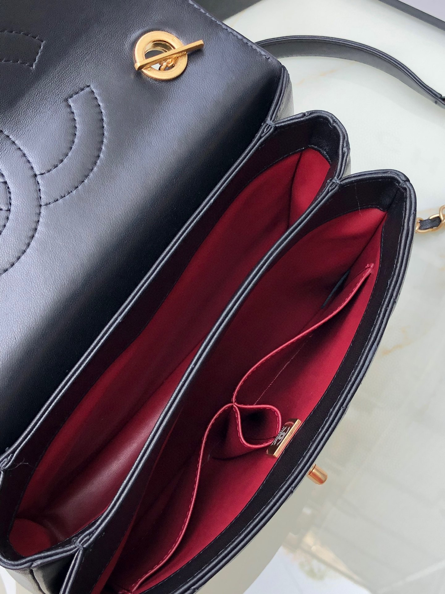 Ch*el flap bag with top handle 6.6 × 9.8 × 4.7 in